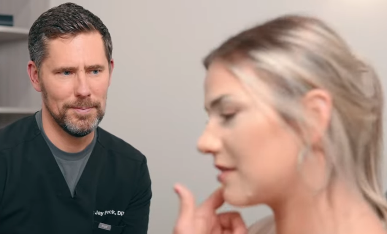 Dr. James Peck evaluating a patient for TMJ pain at Anagen Medical Institute in Edmond, OK